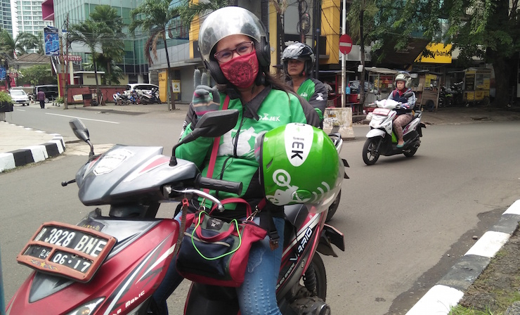 Steering change, Indonesian women take on Jakarta with their motorbikes